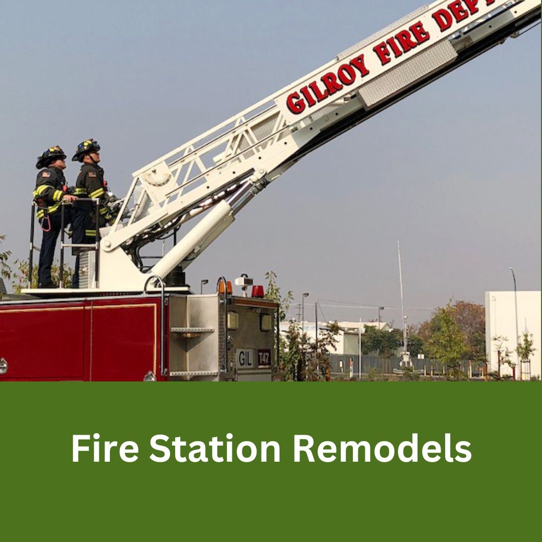 Gilroy Fire Department ladder truck with firefighters elevated during training 